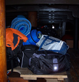 The student's gear nearly reaches the orlop deck's ceiling.