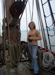 Meaghan stands lookout on the fore deck.