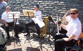 The Signature Brass Quintet pauses between numbers.
