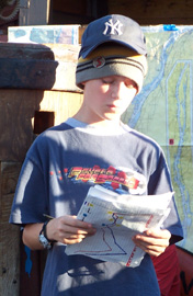 Kyle checks his notes while giving the final presentation.