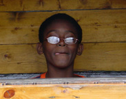 Jamar sticks his tongue out while at the helm.