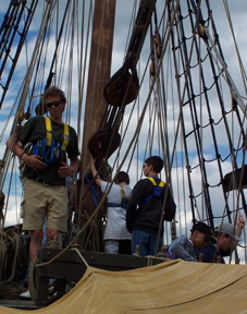 The foremast team works the sails.
