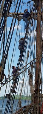 Mr. Weisse follows Ginny and Kiera up the fore rigging.