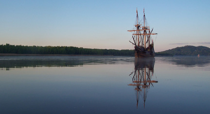 The first rosy rays of dawn touch the Half Moon in Athens Channel.