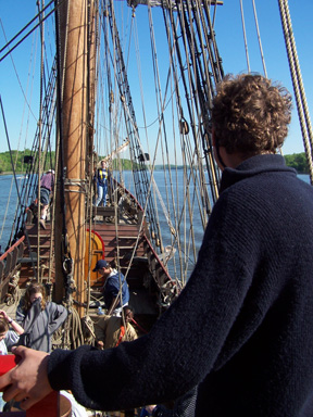 Captain Berg takes command of the quarter deck as we motor toward Albany.