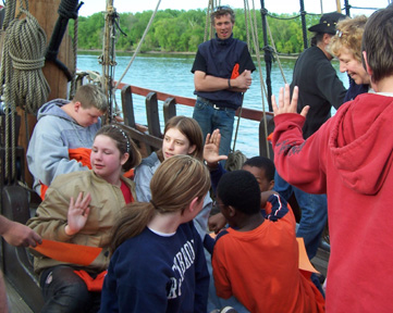 Our new crew members high-five each other after earning their shirts.