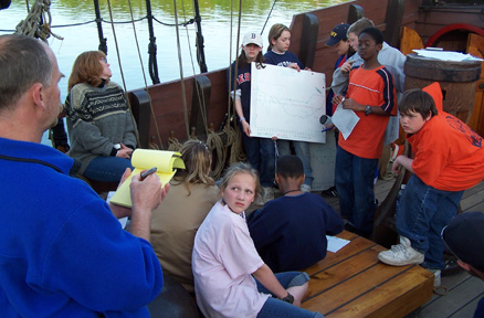 Captain Reynolds questions the water team.