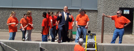 Mayor Jennings and Half Moon volunteers greet the ship at the dock.