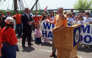 Captain Reynolds at the podium.