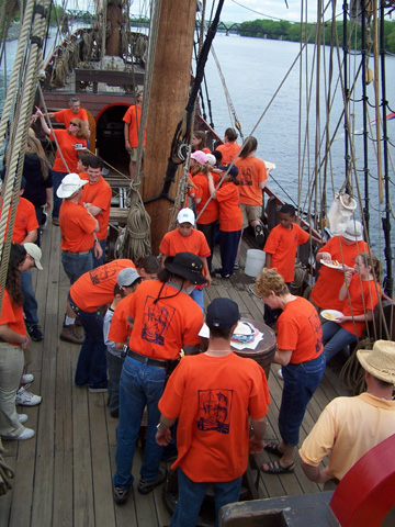 New and former crews join together for lunch on the weather deck.
