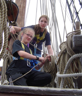 Andi and Kiera coil lines on the foredeck.