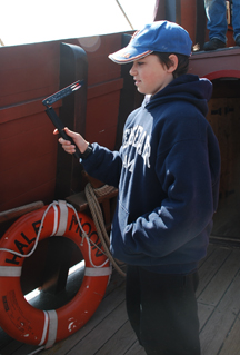 Jacob uses a sling psychrometer.