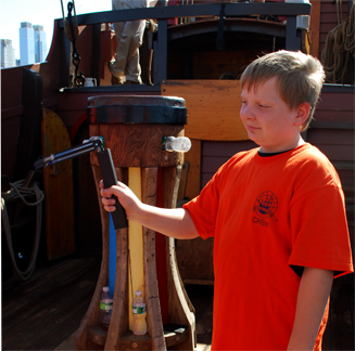 Ben uses a whirling hydrometer to measure relative humidity.