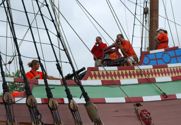 The same swivel gun salute, as seen from the water.