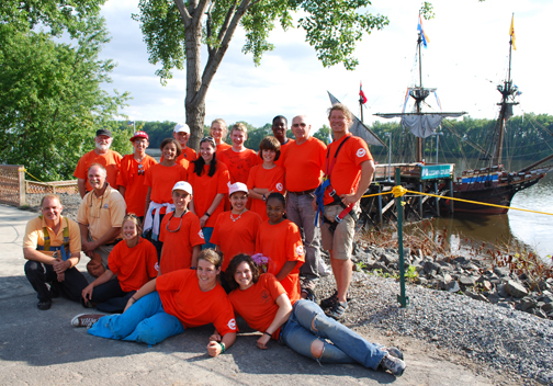 The Voyage of Discovery crew poses before the Half Moon.