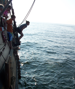 Ms. Johnsen jumps off the main channel with a splash.