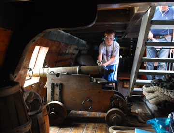 Nick fires the port falconet.