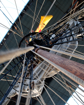 A view straight up the fore mast, with Nick at the top and the bottom of the Tappan Zee Bridge above him.