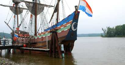 The Half Moon fires a sternchaser salute.