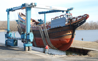 The Half Moon is lowered into the water.