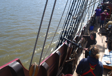 Abigail fires a swivel gun salute to King Marine.