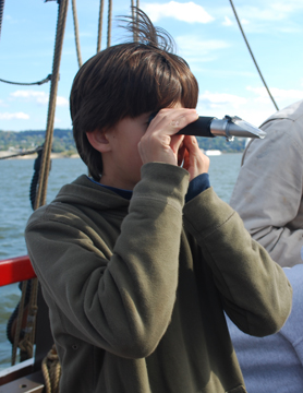 Erin looks through a refractometer.