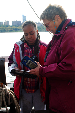 Isis consults with Ms. Bruijn.