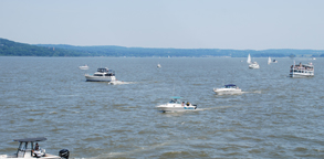 A long pan of the River Day flotilla in Haverstraw Bay.