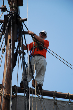 Mr. Mazer stands atop the main topyard.