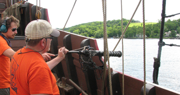 Master Gunner Rodriques and Assistant Gunner Padalka fire a swivel salute to Coxsackie.