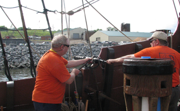 Master Gunner Rodrques and Assistant Gunner Noonan fire a swivel salute.