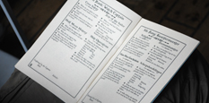 Closeup of the Crew Rating Log lying open.