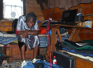 Deniro listens through headphones in the impromptu sound booth.