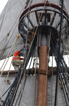 Jason climbs the main mast rig.
