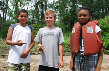 Matt B., Nick, and Raynika show off their crab carapace.