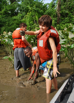 Vincent, Deniro, and Matt G. have fun in the mud.