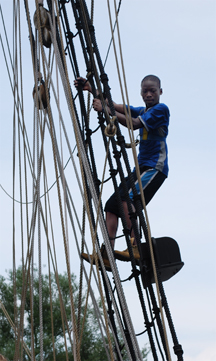 Deniro climbs the rig.