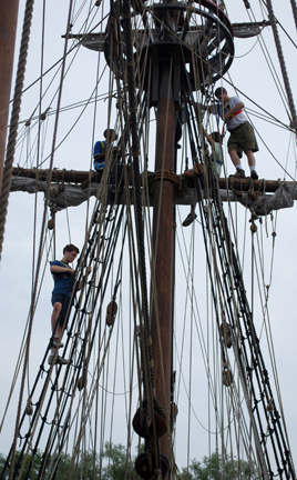 Mr. Weisse oversees the main yard as Jack, Deniro, and Matt G. furl the course.