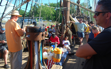Captain Reynolds speaks to the crew over breakfast.