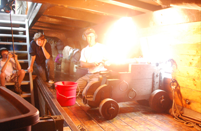 Doug Lyke fires the starboard falconet.