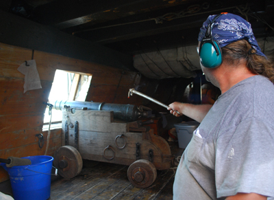 Mr. Prime fires the port falconet.