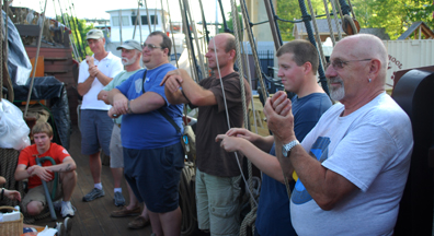 The crew practices hand-washing at the Kingston dock.